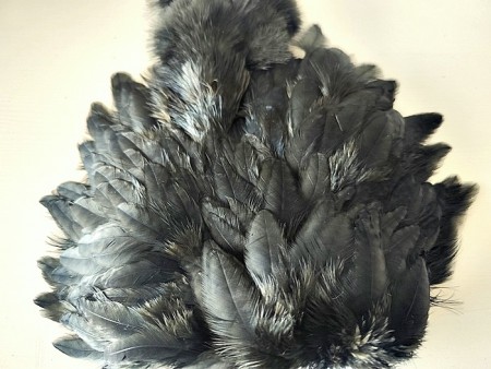 Marabou patch nakker av  svart